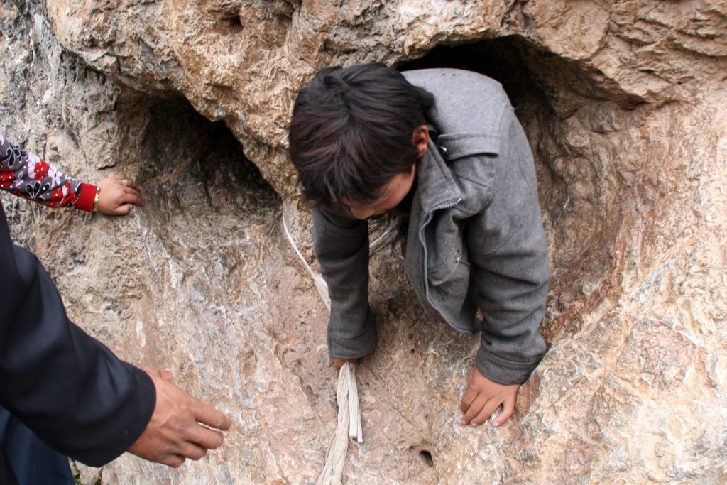 Zhira Gompa Child in the rock
