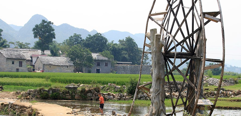 waterwheel Shitou Zhai 石头寨 The stone Bouyi (ethnic group) village of Shitou Zhai  石头寨