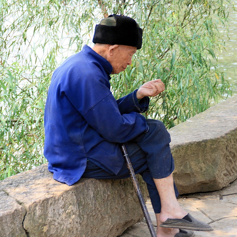 old man Shitou Zhai 石头寨 The stone Bouyi (ethnic group) village of Shitou Zhai  石头寨