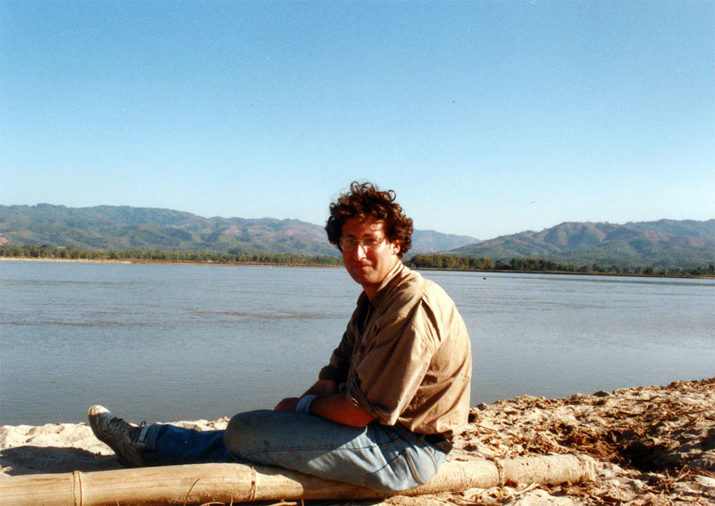 Burma / Myanmar: so close but yet so far; Adam by the Ruili River with Burma behind