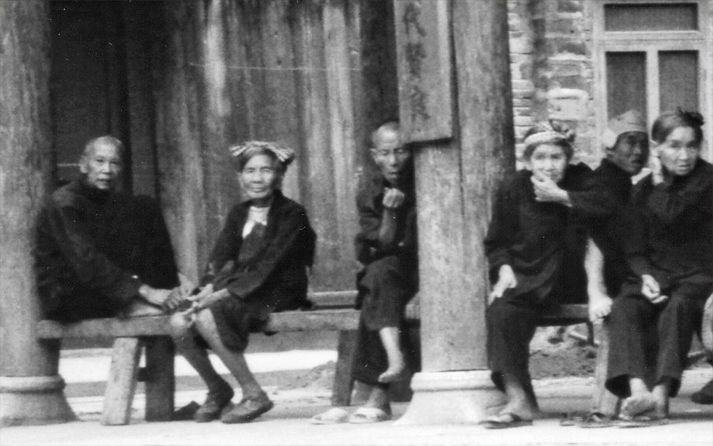 Old Zhaoxing Residents under the main drum tower